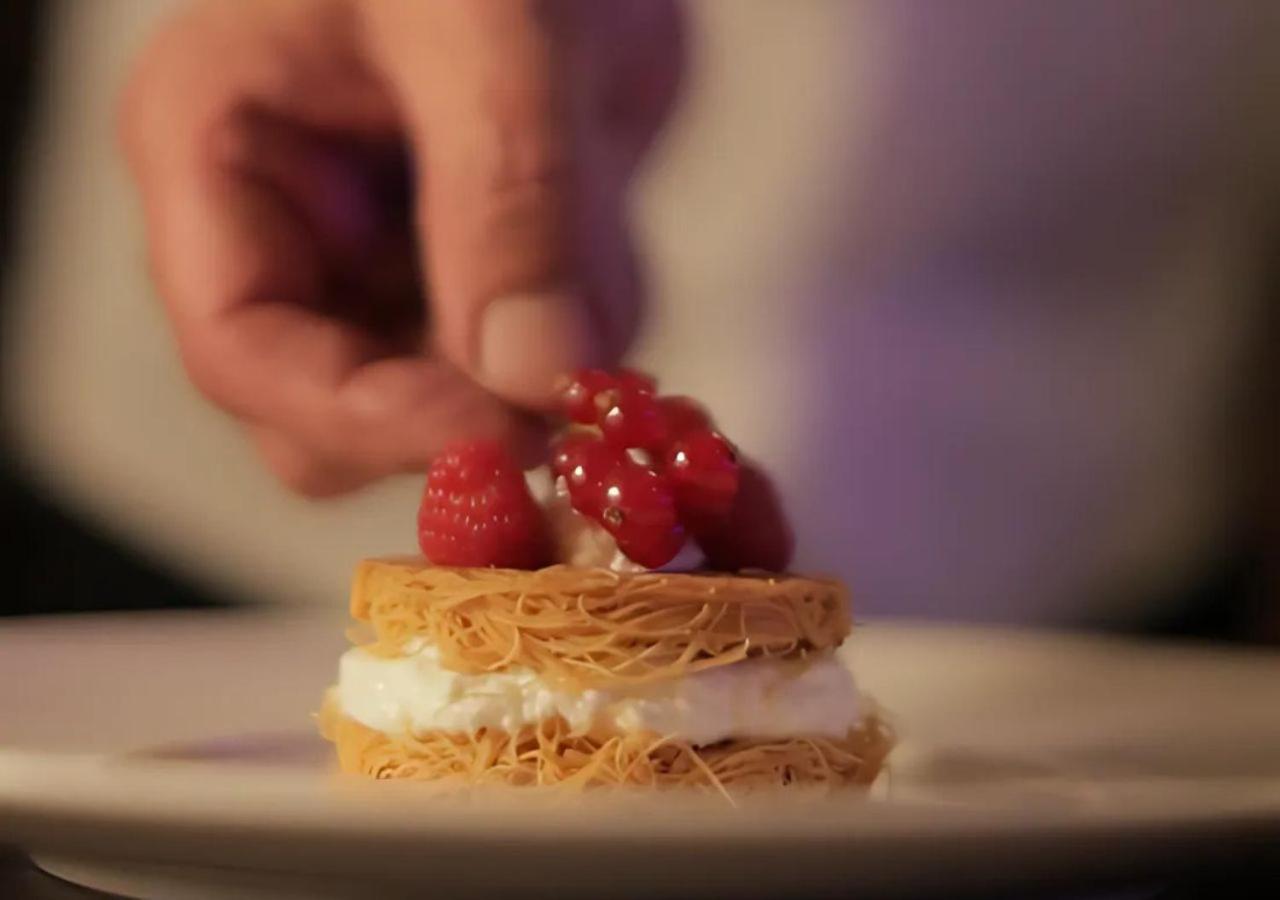 Gefinor Rotana - Beirut Hotel Exterior photo A pastry chef finishing a dessert